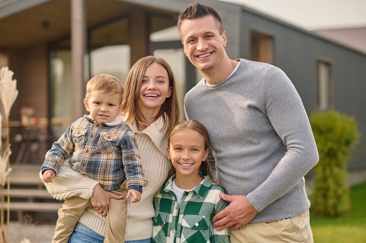 Família sorrindo — plano de saúde Nossa Saúde em Joinville e região, Vida Plena Ville